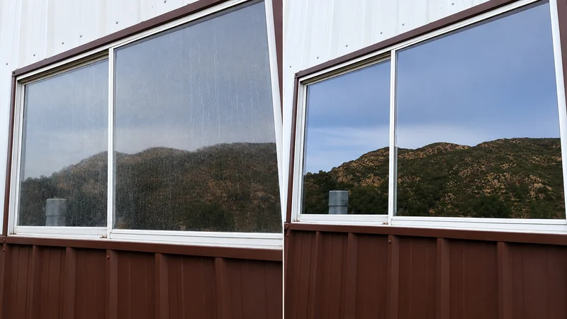 Before and after view of large window glass cleaned in freezing temperatures
