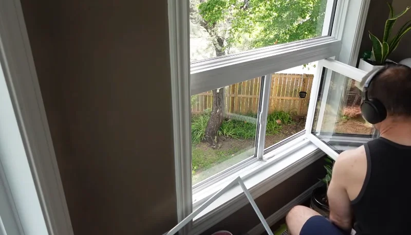 High window cleaning equipment in use
